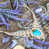 Handcrafted macramé necklace with an Amazonite gemstone centerpiece and brass details, perfect as a gift from a small business for hippie, and wellbeing-focused clients.