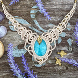 Handcrafted macramé necklace with an Amazonite gemstone centerpiece and brass details, perfect as a gift from a small business for hippie, and wellbeing-focused clients.