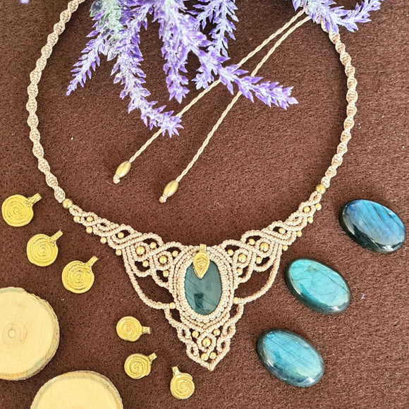 Handcrafted macramé necklace with a labradorite gemstone centerpiece and brass details, perfect as a gift from a small business for hippie, spiritual, and wellbeing-focused clients.