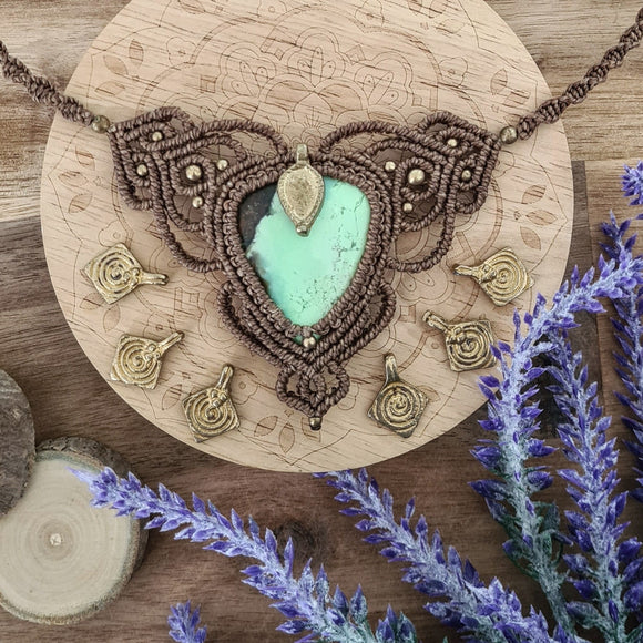 Handcrafted macramé necklace with a Chrysoprase gemstone centerpiece and brass details, perfect as a gift from a small business for hippie, and wellbeing-focused clients.