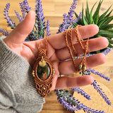 Handcrafted macramé pendant with an Unakite gemstone centerpiece and brass details, perfect as a gift from a small business for hippie, and wellbeing-focused clients.