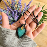 Handcrafted macramé pendant with an Amazonite gemstone centerpiece and brass details, perfect as a gift from a small business for hippie, spiritual, and wellbeing-focused clients.