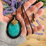 Handcrafted macramé pendant with an Amazonite gemstone centerpiece and brass details, perfect as a gift from a small business for hippie, spiritual, and wellbeing-focused clients.