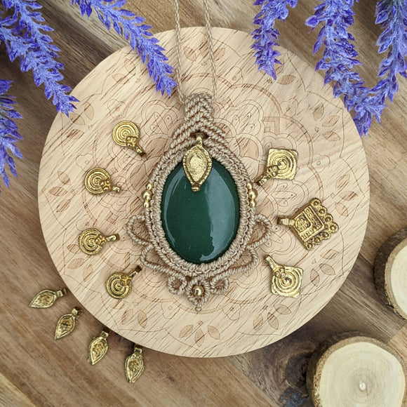 Handcrafted macramé pendant with an Aventurine gemstone centerpiece and brass details, perfect as a gift from a small business for hippie, and wellbeing-focused clients.