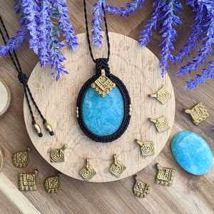 Handcrafted macramé pendant with an Amazonite gemstone centerpiece and brass details, perfect as a gift from a small business for hippie, spiritual, and wellbeing-focused clients.