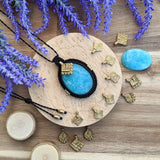 Handcrafted macramé pendant with an Amazonite gemstone centerpiece and brass details, perfect as a gift from a small business for hippie, spiritual, and wellbeing-focused clients.