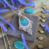 Handcrafted macramé pendant with an Amazonite gemstone centerpiece and brass details, perfect as a gift from a small business for hippie, and wellbeing-focused clients.