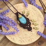 Handcrafted macramé pendant with an Amazonite gemstone centerpiece and brass details, perfect as a gift from a small business for hippie, and wellbeing-focused clients.