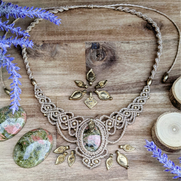 Handcrafted macramé necklace with an Unakite gemstone centerpiece and brass details, perfect as a gift from a small business for hippie, spiritual, and wellbeing-focused clients.