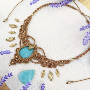 Handcrafted macramé necklace with an Amazonite gemstone centerpiece and brass details, perfect as a gift from a small business for hippie, spiritual, and wellbeing-focused clients.