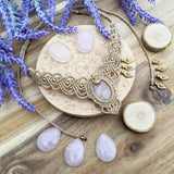 Handcrafted macramé necklace with a Rosa Quartz gemstone centerpiece and brass details, perfect as a gift from a small business for hippie, and wellbeing-focused clients.