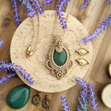 Handcrafted macramé pendant with an Aventurine gemstone centerpiece and brass details, perfect as a gift from a small business for hippie, and wellbeing-focused clients.