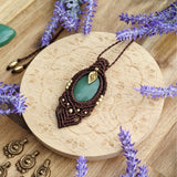 Handcrafted macramé pendant with an Aventurine gemstone centerpiece and brass details, perfect as a gift from a small business for hippie, and wellbeing-focused clients.