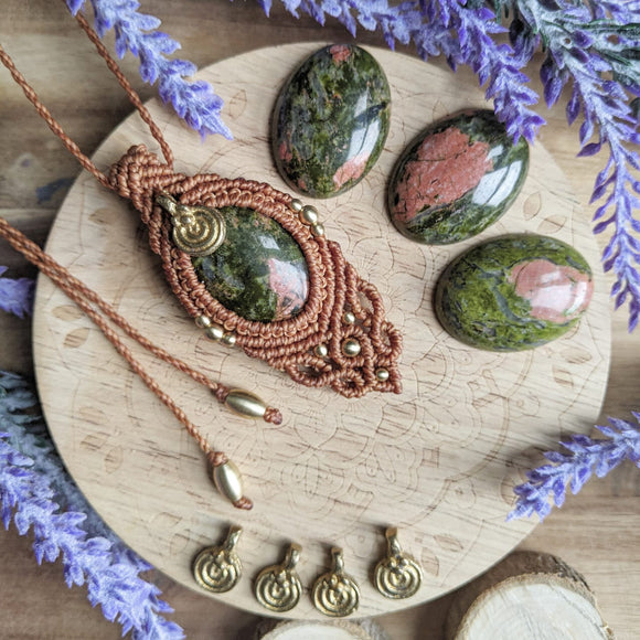 Handcrafted macramé pendant with an Unakite gemstone centerpiece and brass details, perfect as a gift from a small business for hippie, and wellbeing-focused clients.