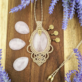 Handcrafted macramé pendant with a Rosa Quartz gemstone centerpiece and brass details, perfect as a gift from a small business for hippie, and wellbeing-focused clients.