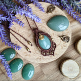 Handcrafted macramé pendant with an Aventurine gemstone centerpiece and brass details, perfect as a gift from a small business for hippie, and wellbeing-focused clients.