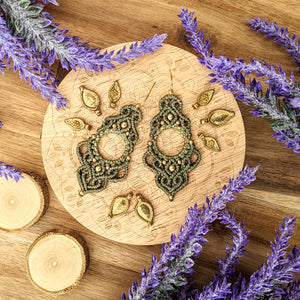 Handcrafted macramé earrings with brass details, perfect as a gift from a small business for hippie, and wellbeing-focused clients.