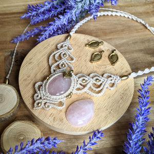 Handcrafted macramé necklace with a Rosa Quartz gemstone centerpiece and brass details, perfect as a gift from a small business for hippie, and wellbeing-focused clients.